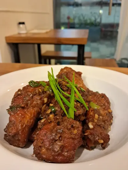 Our famous Axone Chicken Wings are coated in a pungent and flavorful sauce made from fermented soybeans. This dish is a true taste of Nagaland, delivering a powerful umami flavor that is both unique and unforgettable.