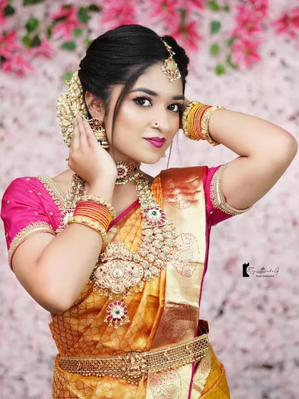 A full look from a styled bridal shoot. This showcases how makeup, hair, jewellery, and outfit come together to create a complete and stunning picture.