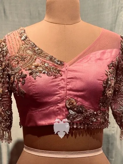 Another view of Sireesha's reception blouse, highlighting the interplay of net and silk.