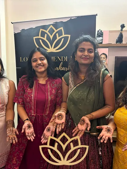 The bride and her friends posing with their mehendi. We love creating a fun and memorable experience for the entire bridal party.