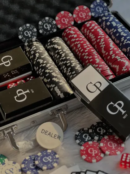 A full view of the custom poker set. This makes a fantastic and unique wedding gift for a couple who enjoys hosting, with personalized chips, cards, and a dealer button.