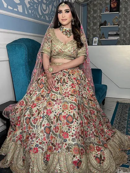 A full view of the floral lehenga, showing its beautiful flare and how it sits elegantly.