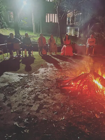 A peaceful evening gathering around a bonfire at our retreat. Sharing stories and chanting under the stars is a wonderful way we connect with nature, each other, and the Divine.