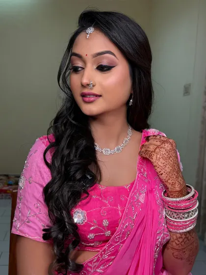 A beautiful portrait of Meena. The makeup is soft and pretty, enhancing her features without being too heavy for an engagement ceremony.