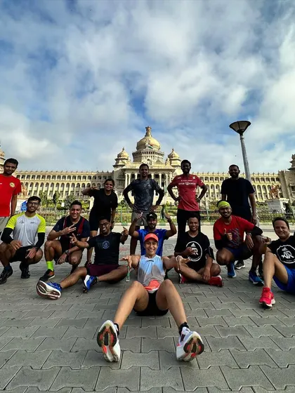 Another great shot of our running crew posing in front of the Vidhana Soudha. We are proud to run in our city and represent our community.