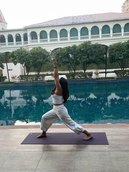 The practice of yoga empowers. I used to be uncomfortable in front of a camera, but through yoga, I have found a confidence that comes from within. Now I care less about the outcome and more about the feeling.