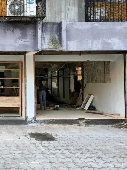 The storefront during the early stages of demolition, opening up the space to the street.