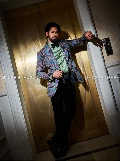 Ankush Bahuguna strikes a pose in our multi-hued jacket, a perfect balance of casual and sophisticated style. The cool tones and detailed print add a refined touch to everyday wear.
