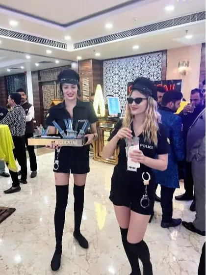 We can match our service to your party's theme, including fun costumes like this police getup for serving shots and interacting with guests.