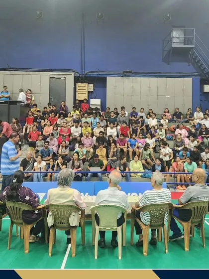 A view of the audience and dignitaries at the inauguration of the 37th Thane District Championships. I ensure my events are well-attended, creating an electric atmosphere for the players.