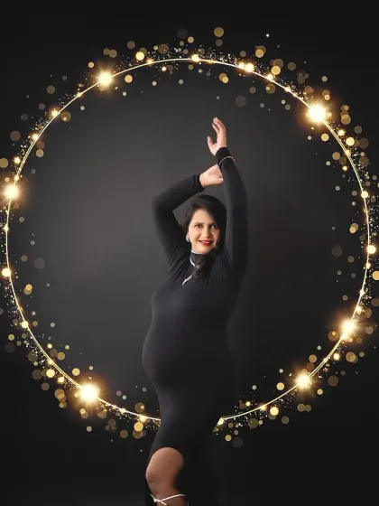 We added a touch of sparkle to this glamorous maternity shot. The golden ring of light perfectly frames the mom-to-be, celebrating her second journey into motherhood.