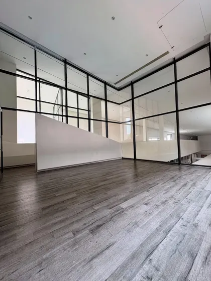 This was the beginning of it all. An empty room filled with a big dream. This is the space before it became our R1 Dance and Yoga Studio, a place I manifested to build a community of dancers.