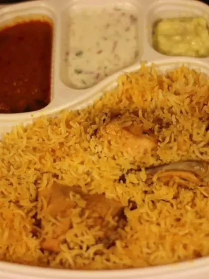 Our classic chicken biryani served in a convenient takeaway thali. It comes complete with a side of spicy salan and cooling raita.