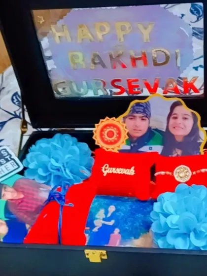 An elaborate Rakhi gift trunk for a brother, filled with personalized pillows, photos, and other custom items.