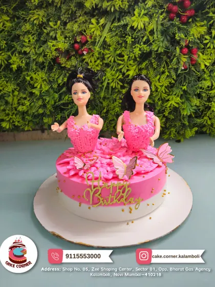 Double the fun with this Barbie cake featuring two dolls in pink gowns. It's perfect for a shared birthday party or for a girl who just loves Barbie.