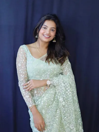 A happy and bright portrait of Sonu, showing how comfortable and stylish our sarees are.