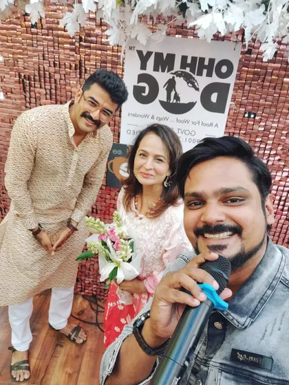 A fan moment with film producer Smita Thackeray at an event. I am comfortable interacting with dignitaries from various fields, always maintaining a respectful and pleasant demeanor.