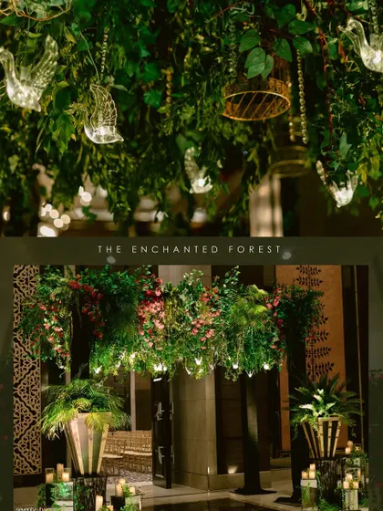 Details of the enchanted forest decor, including hanging glass birds and terrariums, adding to the magical theme.