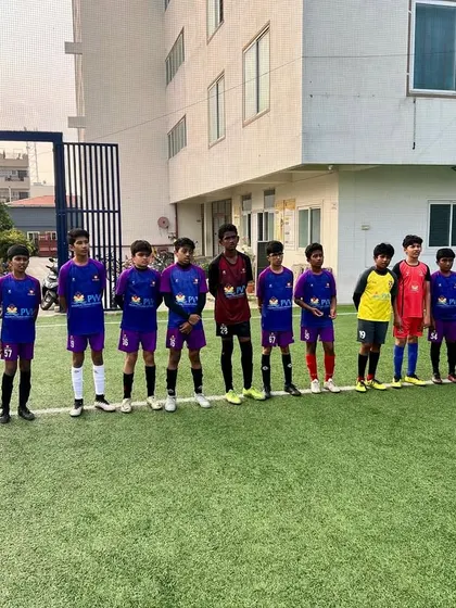 The calm before the Saturday storm. Our U-13 team lines up before their match, focused and ready.