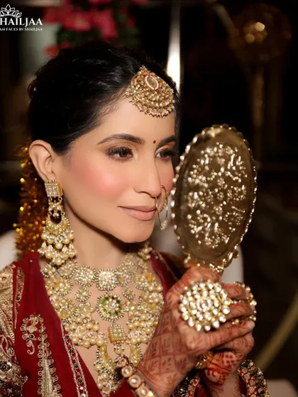 A quiet moment of reflection before the big ceremony. I created this soft, romantic bridal look with a focus on glowing skin and subtly defined eyes, ensuring the bride felt like the best version of herself.