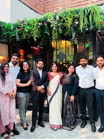A group photo with my respected colleagues and team members at a professional gathering.