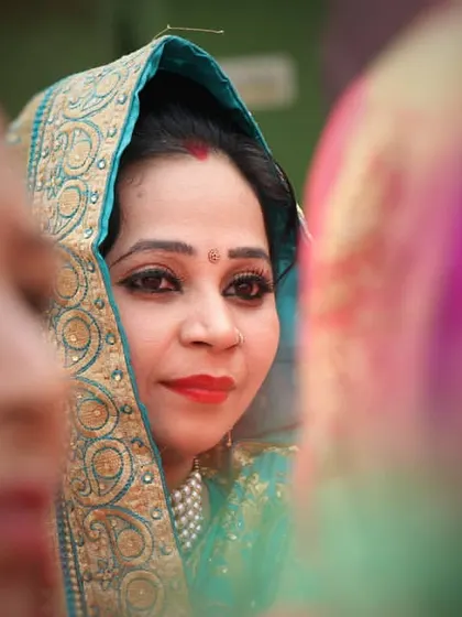 Another candid moment capturing a guest's expression during the wedding. These photos help to tell the complete story of your celebration, showing the joy shared by everyone present.