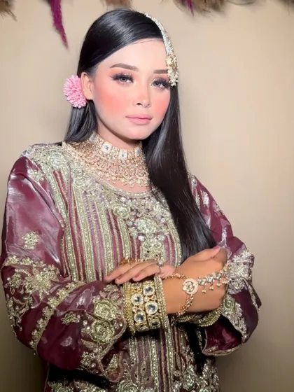 A full shot of the traditional look, showing how the makeup, hair, and outfit come together to create a masterpiece.