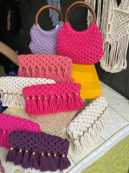 A colorful collection of my handmade clutch bags! From handle bags to fringed clutches, each one is made with so much care in my studio.
