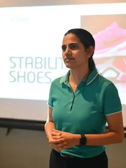 Discussing the features of stability shoes during my presentation for the Nike Ekin team.