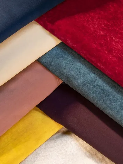 Our premium velvet fabric collection, layered to show a story of elegance and sophistication. From deep navy and rich mustard to soft blush, these velvets add a luxurious touch.