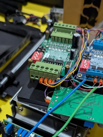 A close-up of the complex circuitry and wiring for a robotics project being built at the workshop. Our space supports makers exploring electronics, robotics, and IoT, providing the tools and environment to experiment with new technologies.