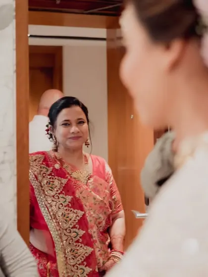 A mother's loving gaze as she sees her daughter ready as a bride. These are the emotional memories we help create.