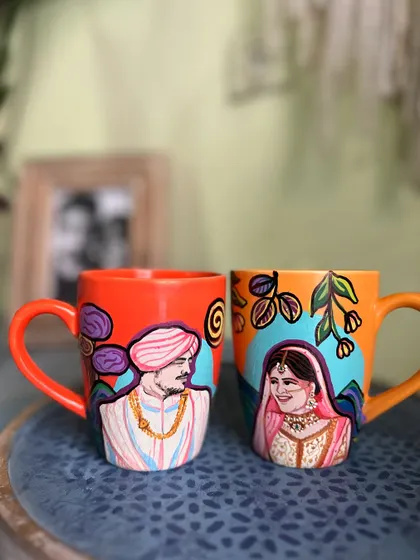 The perfect mug to gift your newlywed friends, featuring portraits of the bride and groom in their wedding attire.