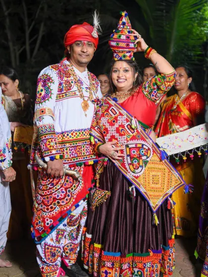 The couple looking regal in their traditional Gujarati attire.