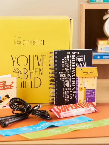 The perfect gift for a fitness enthusiast, this box includes a jump rope, resistance bands, a fitness journal, and healthy protein snacks to support their wellness journey.