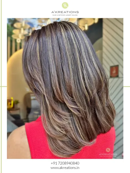 Cozy shades of brown highlights that are perfect for any season, shown here on a client's "before" hair.
