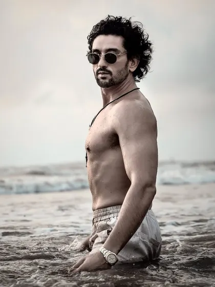 A striking beach portrait of actor Shaad Randhawa. I specialize in outdoor shoots that create a moody and cinematic feel.