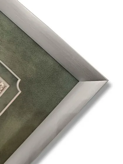 This stunning silver masterpiece is encased in our sleek Kyoto silver metal frame and preserved with the highest quality museum glass. The green suede mat adds a touch of color and luxury.
