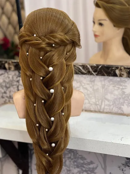 The finished advanced open hairstyle, a true masterpiece for a special occasion.