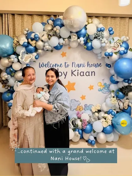The celebration continued with a grand welcome at Nani's house for baby Kiaan! I designed this beautiful blue and silver balloon arch with butterfly details to make the moment unforgettable.