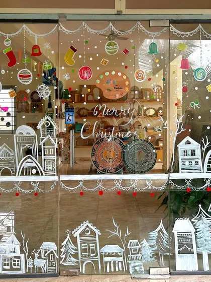 Another view of the Christmas decorations on my studio's glass doors. It’s amazing what you can do with some paint and an impromptu idea.
