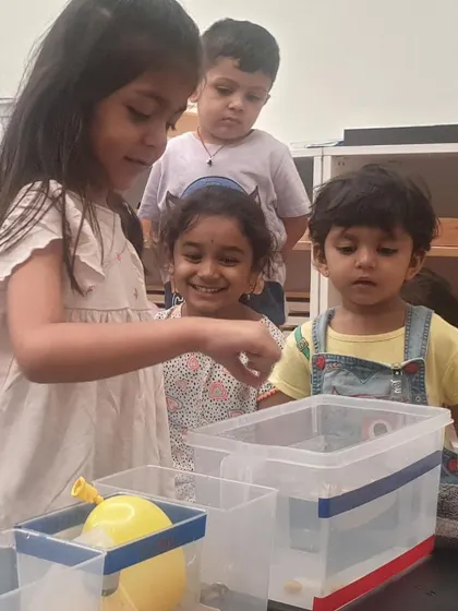 Each activity, from making Bhel Puri and toast to plucking methi leaves and exploring what floats, is a lesson in itself. These practical life and sensorial activities are central to the Montessori method, helping children develop fine motor skills, concentration, and a deep understanding of the world through their own actions.