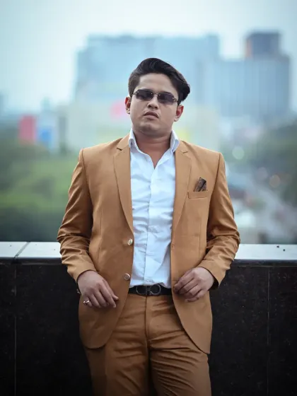 This close-up portrait was taken during an outdoor session in Delhi NCR. The goal was to create a confident and modern look for a personal branding portfolio, using the city skyline as a subtle backdrop.