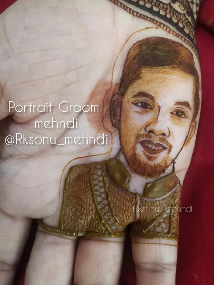 A close-up of a bespoke groom's henna, showcasing the fine details of the portrait. Capturing a likeness in mehndi requires precision and care, creating a piece of art that is truly one of a kind.