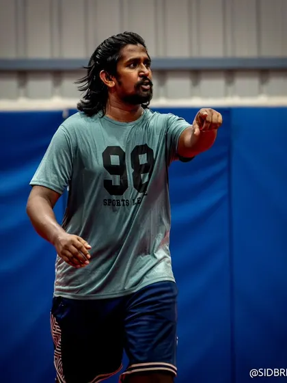 A player directing traffic on the court, showing the leadership and communication skills we instill in our athletes.