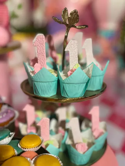 Every detail matters. For this first birthday, I created custom cupcakes with edible "1" toppers, ensuring even the smallest desserts fit the grand carnival theme.