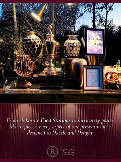 Our presentation is designed to dazzle and delight, from elaborate food stations to intricately plated masterpieces. This image captures the grandeur of one of our buffet setups.