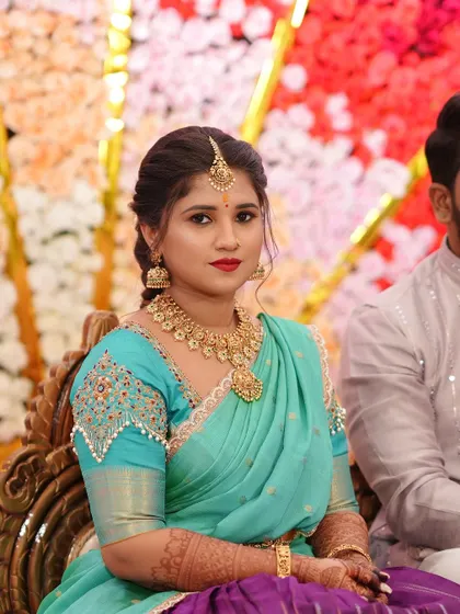 A duplicate of the previous image, capturing her elegant reception look.