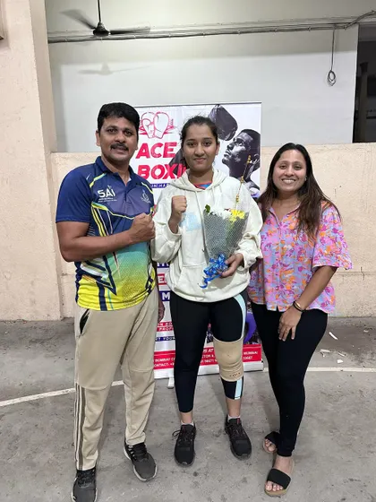 Our head coach with two-time CISCE National Gold Medalist Prisha Pawar and her proud mother. We believe in a strong support system, and parents are a crucial part of our boxers' success.