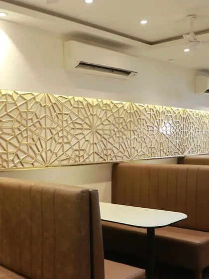 The modern yet traditional decor of our Kurla branch. We've paid attention to every detail to ensure a great dining experience.